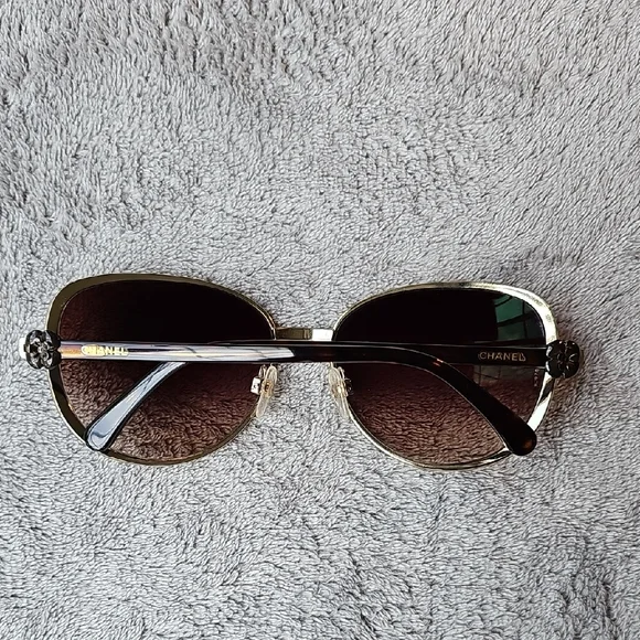 CHANEL Women's Sunglasses with Gold Frame and Brown Lenses - Picture 9 of 11